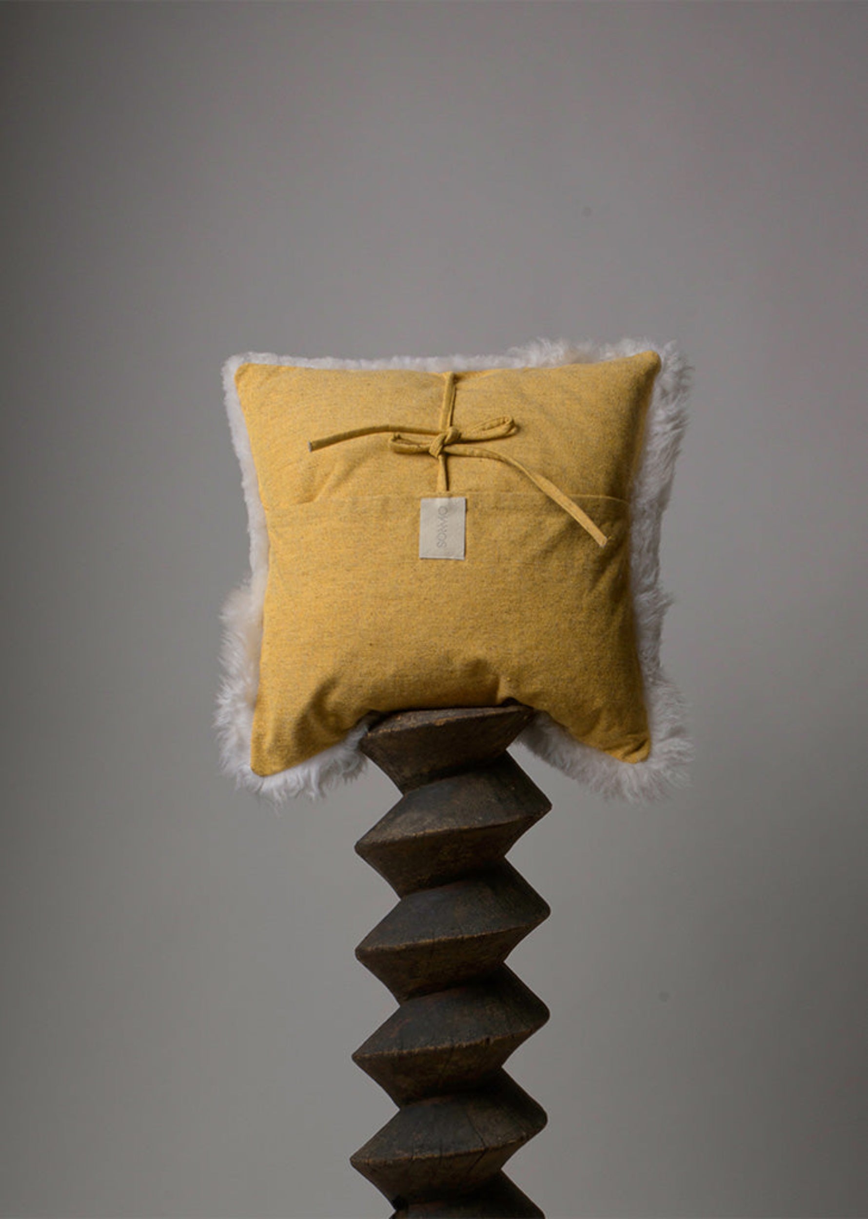 "MONTAÑA" LEATHER AND WOOL CUSHION COVER