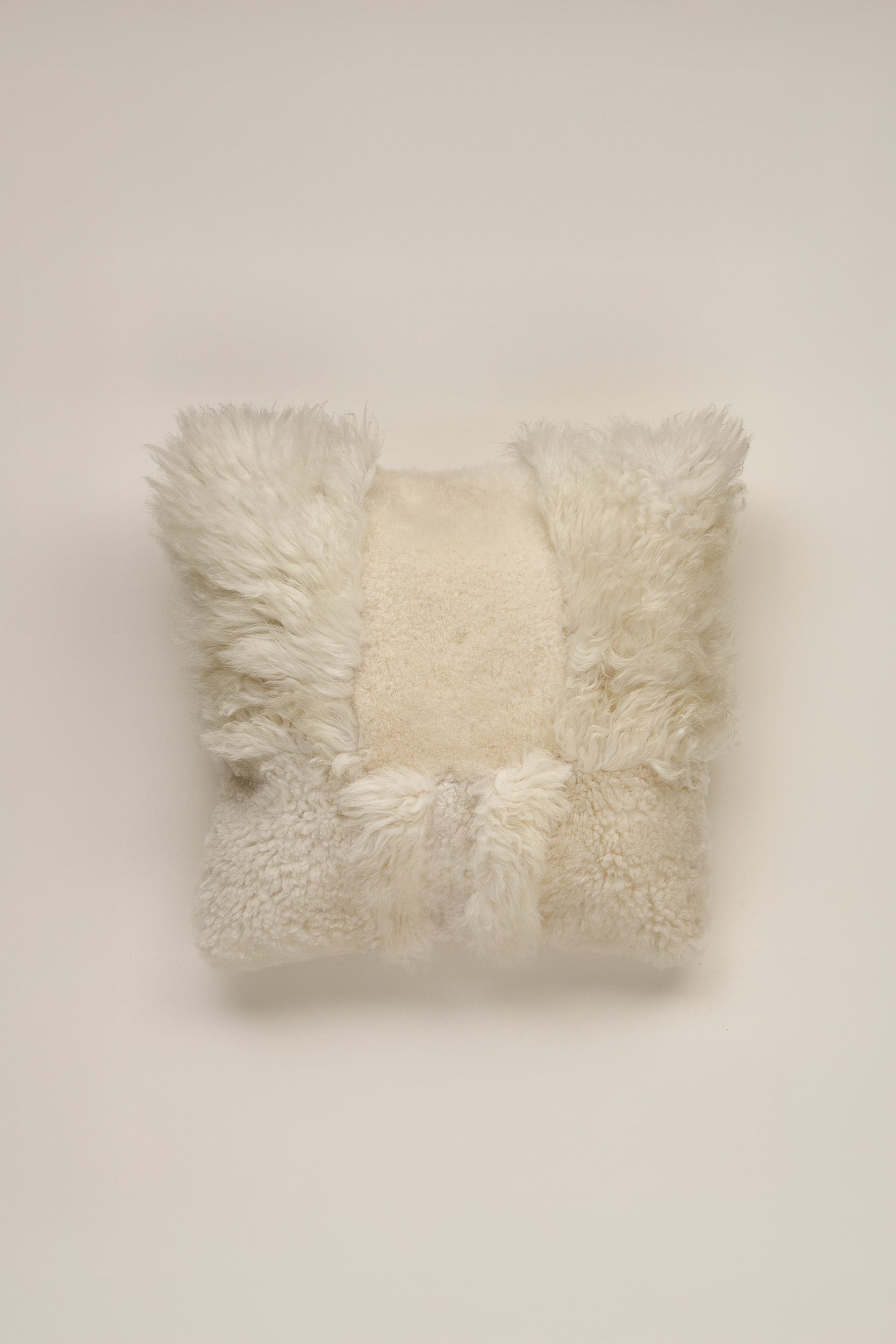 FUNDA DE COJÍN DE PIEL Y LANA "HORT" PELO LARGO