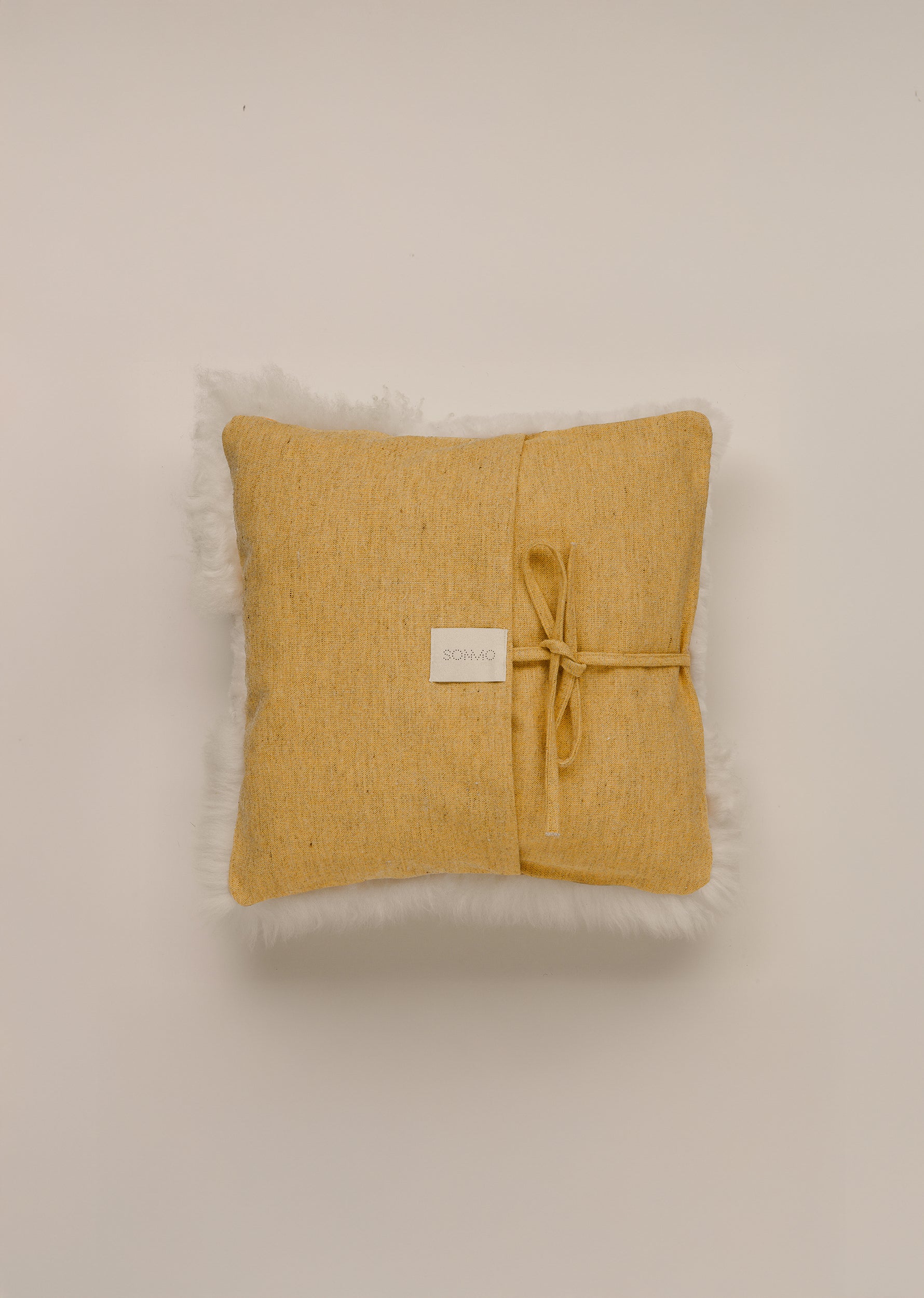 "MONTAÑA" LEATHER AND WOOL CUSHION COVER