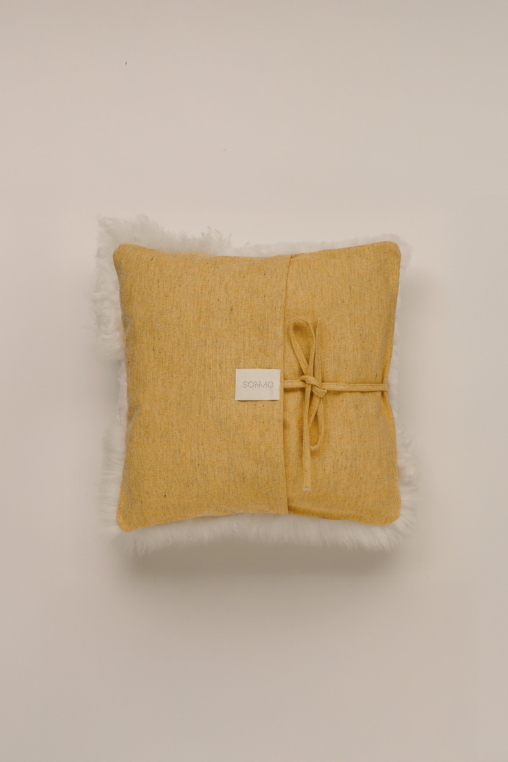 "MONTAÑA" LEATHER AND WOOL CUSHION COVER