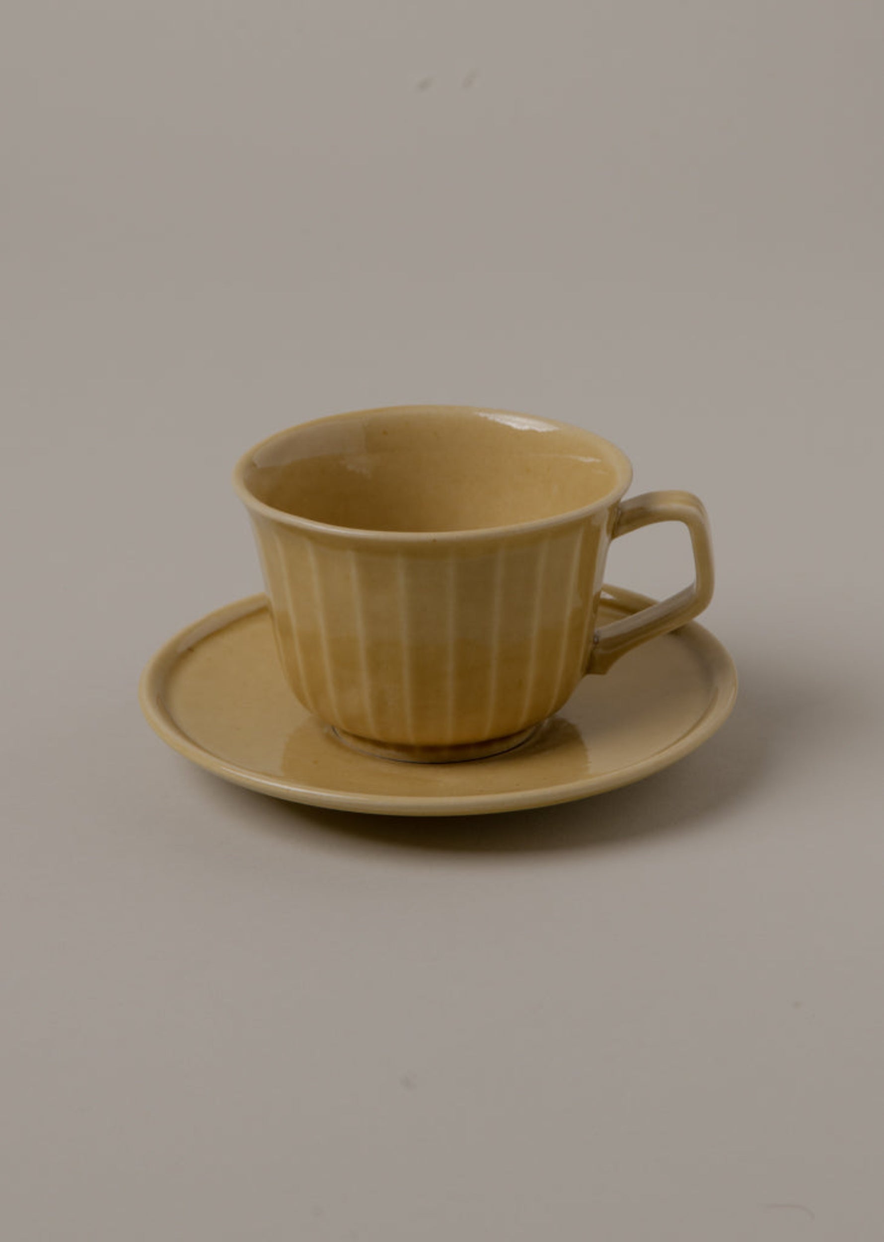 COFFEE CUP AND MATCHING SAUCER SET