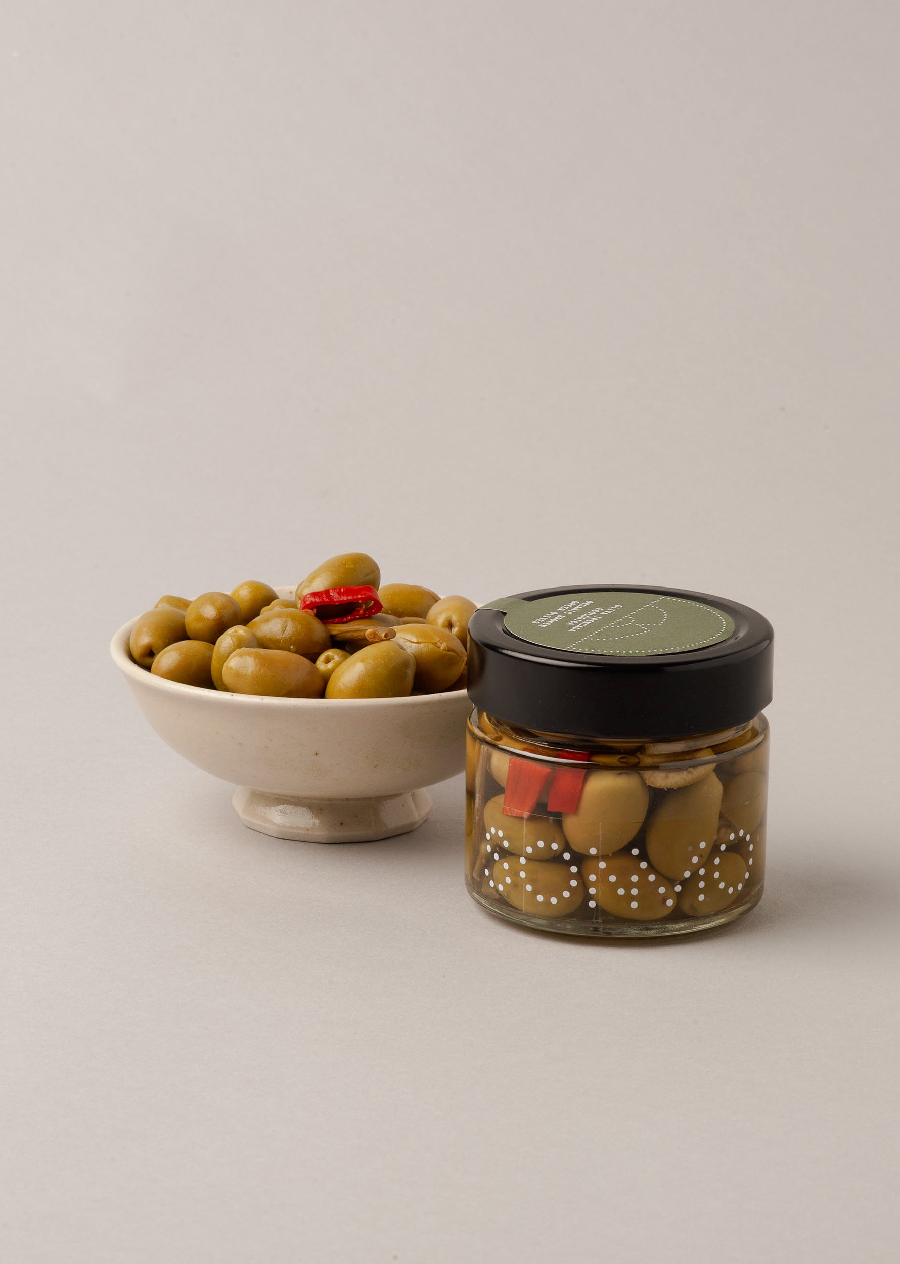 ORGANIC BROKEN GREEN OLIVES